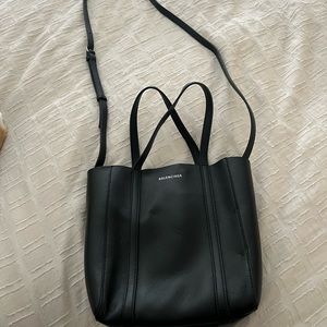 Black Balenciaga bag. Can be worn crossbody or on shoulder. In great condition.